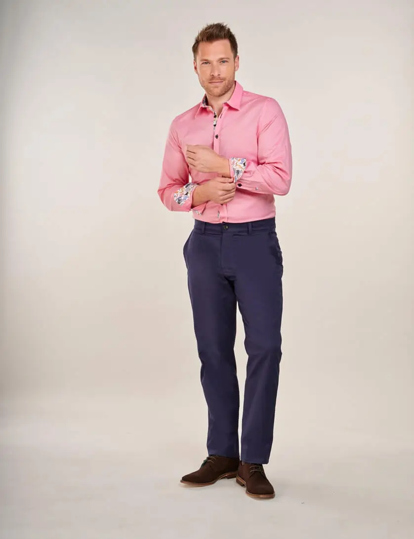 pink shirt with navy chinos